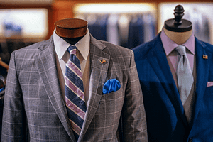 gray and blue suits on display